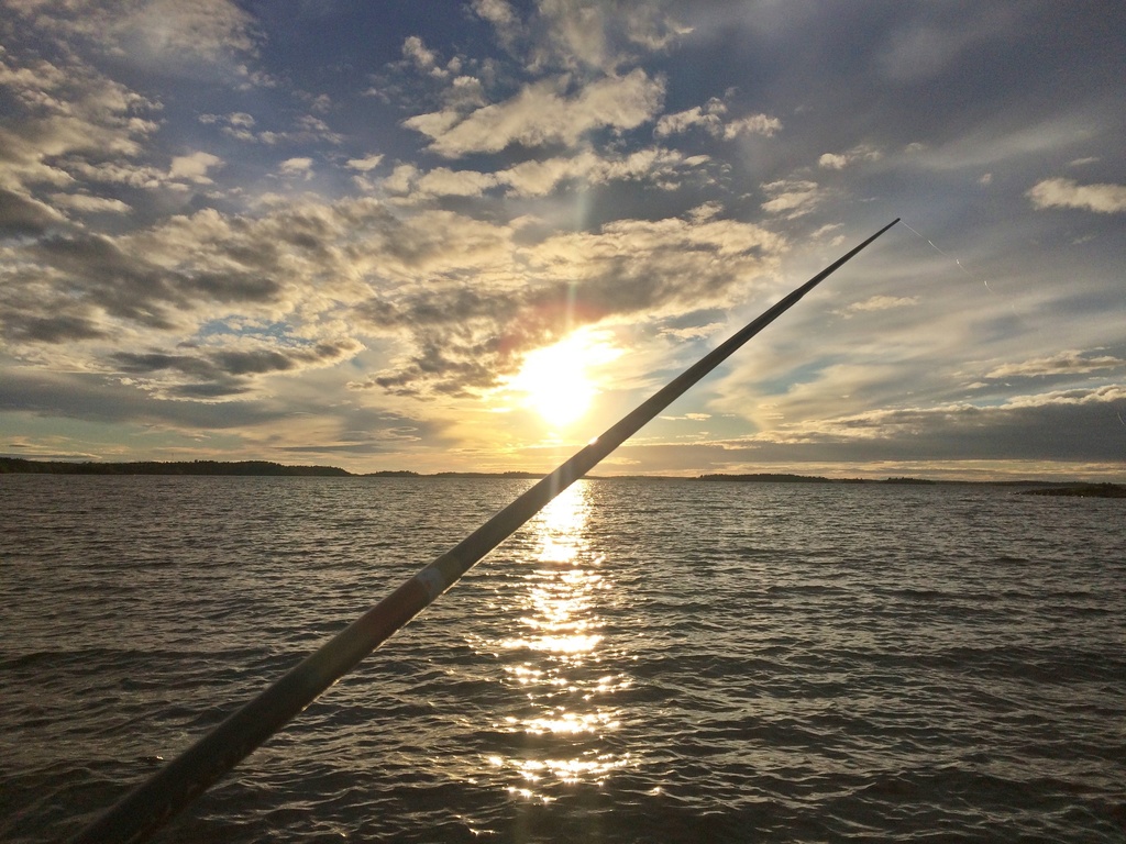 Fiskelycka i solnedgång